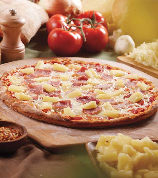 Hawaiian pizza with pineapple and ham