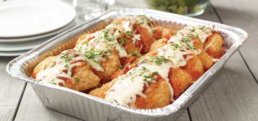 Chicken parmesan in an aluminum tray